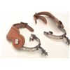Image 5 : Pair of un-marked inlaid spurs with tooled  leather straps; nicely accomplished.      Est.:  $150-$3