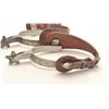Image 4 : Pair of steel silver spurs with tooled  leather straps; consignor indicates Crescent  City Prison or
