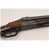 Image 2 : Aug. Jung of Viernau Drilling, 16 gauge and  8mm calibers, serial #2891.  The rifle is in  very good