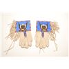 Image 1 : Ca. 1930’s Blackfoot men’s pair of gauntlets  with fringes and beaded eagle design;  approximately 1