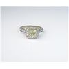 Image 6 : Exceptional ladies ring featuring a center  2.02 carat Fancy Yellow diamond of VS clarity  and surro