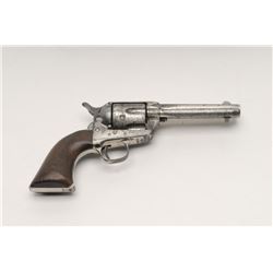 Colt Single Action Army, .44-40, 4 ¾” etched  panel barrel, Nickel finish, wood grips, S/N  80696. T