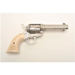 Engraved Cimarron (by Uberti) SAA revolver,  .45 Colt caliber, 4.75” barrel, nickel  finish, faux ra