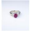 Image 1 : Vivid Pink Tourmaline and Diamond Ring  featuring an oval 2.00 carat  pink tourmaline  accented with