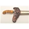 Image 2 : Fancy Kris from Indonesia with ornate  scabbard and carved grip. Meteorite steel  blade. Good condit