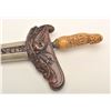 Image 5 : Fancy Kris from Indonesia with ornate  scabbard and carved grip. Meteorite steel  blade. Good condit
