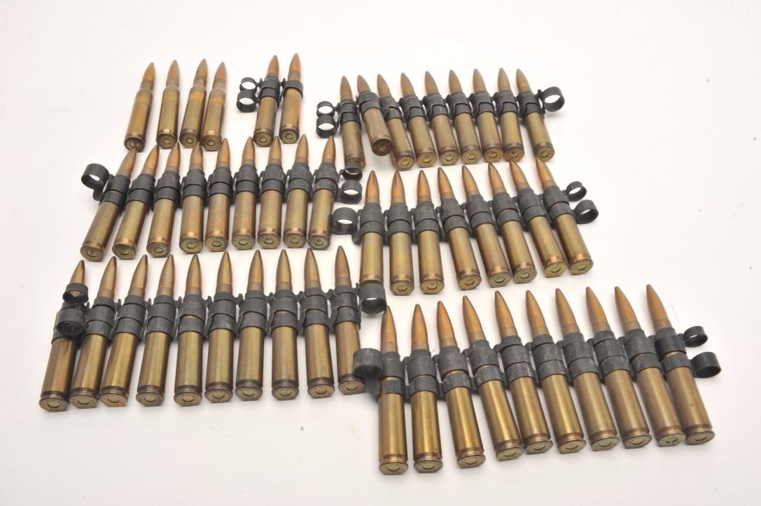 Lot Of 52 Rounds Of Linked 50 Caliber Bullets The Rounds All Bear The Lot Of 52 Rounds Of Linked 50 Caliber Bullets The Rounds All Bear The