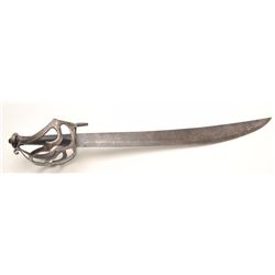 Reproduction pirate sword for theatrical  productions.  The sword is in good condition  with a 22” b