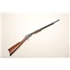 Image 1 : Winchester Model 1890 pump action rifle, .22  W.R.F. cal., 24” octagon barrel, blue finish,  wood st
