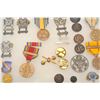 Image 2 : Riker case of approximately 28 U. S. military  medals, buttons, ribbons, etc. including a  Calif. Na