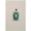 Image 1 : One beautifully designed pendant in 14k white  gold set with a 24 x 18 mm natural oval  turquoise. E