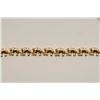 Image 2 : One 14k yellow gold bracelet of elephants in  a row weighing approx 9.2gms. Est. $450-$900.