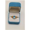Image 1 : One Swiss blue oval topaz weighing approx 6ct  set in an ornate filigree 14k yellow gold  mounting. 