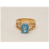 Image 4 : One Swiss blue oval topaz weighing approx 6ct  set in an ornate filigree 14k yellow gold  mounting. 