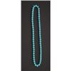 Image 2 : One strand of fine turquoise necklace. Length  24inches diameter 10-11 mm. Est. $350-$700.