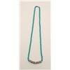 Image 1 : One fine turquoise necklace with a decorative  silver sleeve. Est. $100-$200.