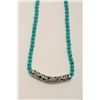 Image 2 : One fine turquoise necklace with a decorative  silver sleeve. Est. $100-$200.