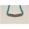 Image 3 : One fine turquoise necklace with a decorative  silver sleeve. Est. $100-$200.