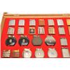 Image 2 : Great lot of antique and vintage pocket  lighters, 49 of which are housed in 2 wood  and glass displ