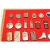 Image 4 : Great lot of antique and vintage pocket  lighters, 49 of which are housed in 2 wood  and glass displ