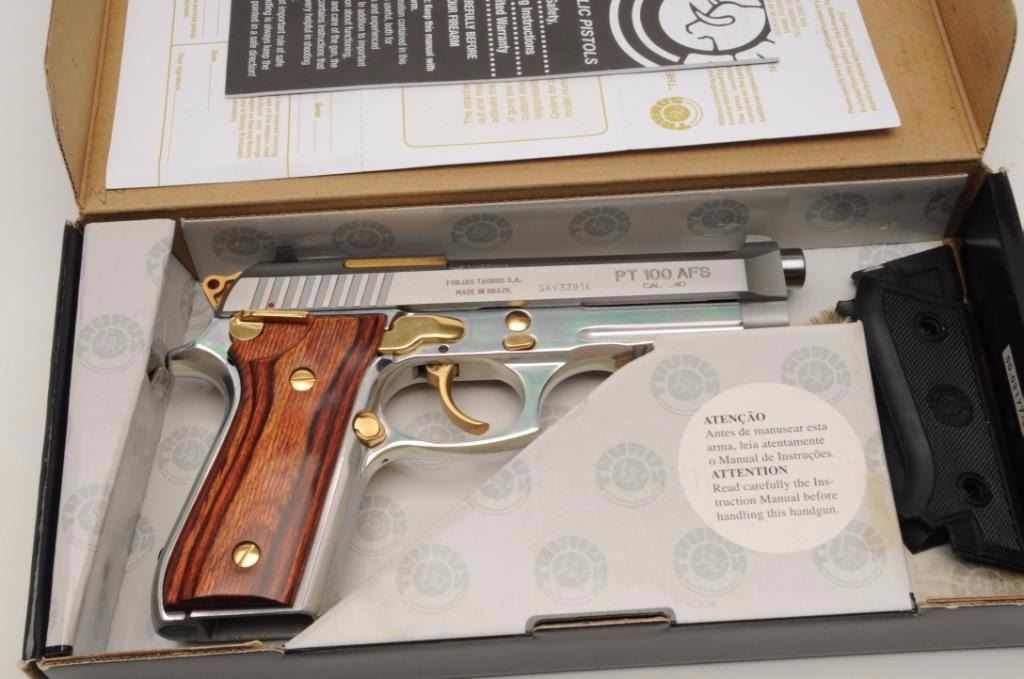 Taurus Pt100 Afs Semi Auto Pistol In 40 Caliber With A 4 7 8 Barrel Stainless Steel Finish With Taurus Pt100 Afs Semi Auto Pistol In 40 Caliber With A 4 7 8 Barrel Stainless Steel Finish With