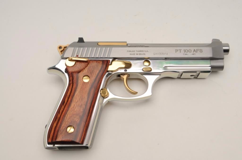 Taurus Pt100 Afs Semi Auto Pistol In 40 Caliber With A 4 7 8 Barrel Stainless Steel Finish With Taurus Pt100 Afs Semi Auto Pistol In 40 Caliber With A 4 7 8 Barrel Stainless Steel Finish With