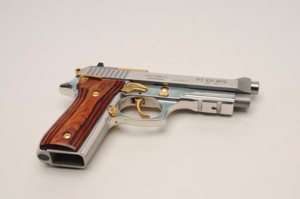 Taurus Pt100 Afs Semi Auto Pistol In 40 Caliber With A 4 7 8 Barrel Stainless Steel Finish With Taurus Pt100 Afs Semi Auto Pistol In 40 Caliber With A 4 7 8 Barrel Stainless Steel Finish With