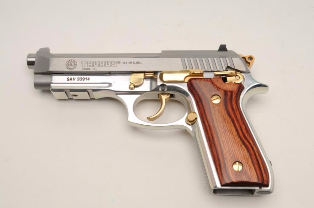 Taurus Pt100 Afs Semi Auto Pistol In 40 Caliber With A 4 7 8 Barrel Stainless Steel Finish With Taurus Pt100 Afs Semi Auto Pistol In 40 Caliber With A 4 7 8 Barrel Stainless Steel Finish With