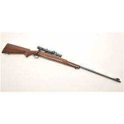 Winchester Model 54 bolt action rifle, .220  Swift caliber, 26” round barrel, blued  finish, checker