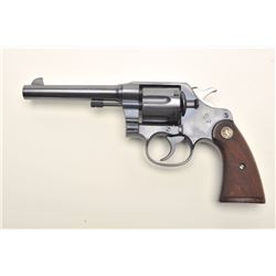 Colt Model 1917 Civilian DA revolver, .45  Auto caliber, 5.5” barrel, blued finish,  checkered wood 