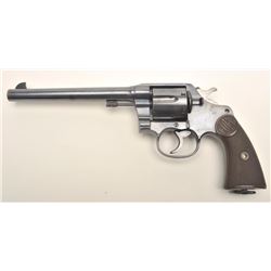 Colt New Service DA revolver, .45 Colt  caliber, 7.5” barrel, blued finish, checkered  black hard ru