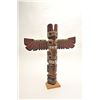 Image 1 : Hand carved N.W.Coast totem pole in classic  motiff signed by well known native artist L.  Rudick, S