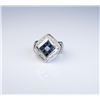 Image 1 : Striking Blue Sapphire and Diamond Ring in  bold design featuring 8 blue sapphires  invisible set wi