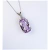 Image 1 : Amazing Pendant featuring a Fine intense pink  Kunzite weighing approx. 15.00 carats and  accented w