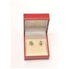 Image 1 : 2 oval cut natural emeralds approx 2 ct  estimated wt mounted in 14kt yellow gold with  24 round dia