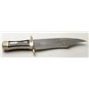 Image 1 : Handmade exhibition size bowie knife with  Damascus blade showing arrow signature on the  horn grip.