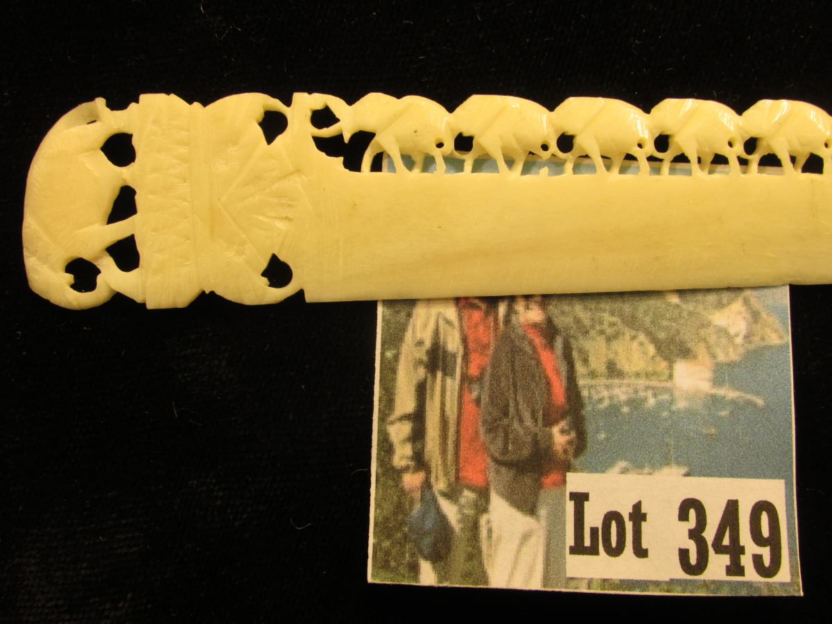 Ivory Letter Opener with Elephants following elephants ornate carvings. 7".