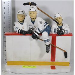 THREE BOYS 99,66,11 AT HOCKEY RINK STATUE