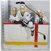 Image 1 : THREE BOYS 99,66,11 AT HOCKEY RINK STATUE
