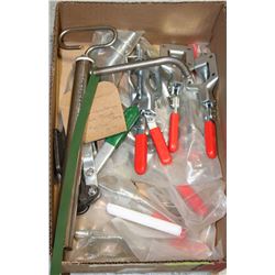 BOX OF WELDING CLAMPS, AND HAND PUMP