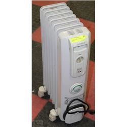NOMA RADIANT OIL HEATER ON WHEELS