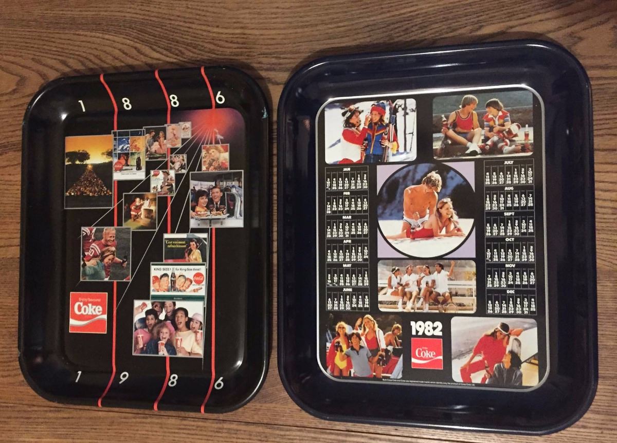 Lot Of 2 Coca Cola Trays 1982 1986 Bodnarus Auctioneering lot-of-2-coca-cola-trays-1982-1986-bodnarus-auctioneering