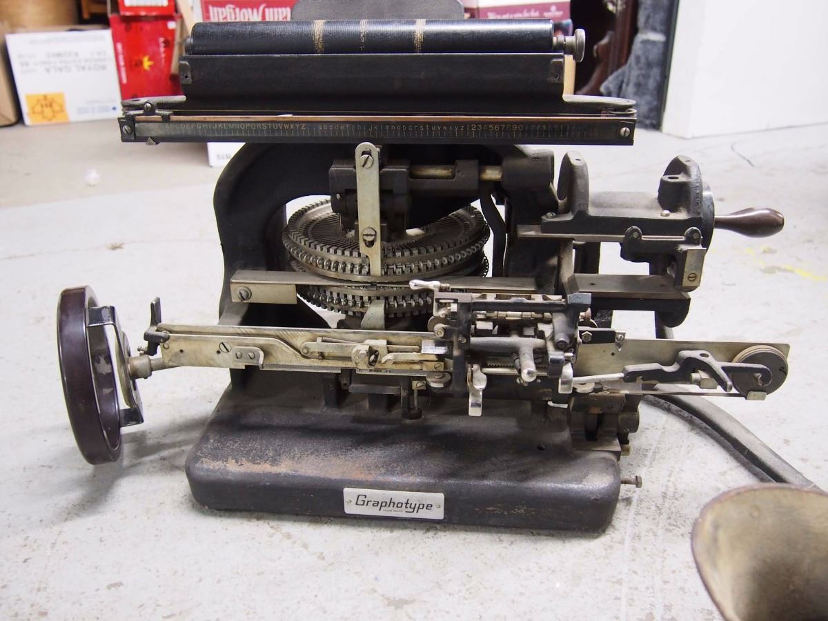 Graphotype Dog Tag Embosser With a Dominion Meat Grinder