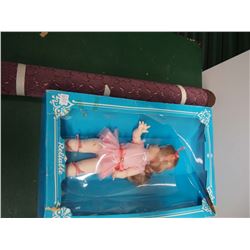 Doll With Fabric Roll