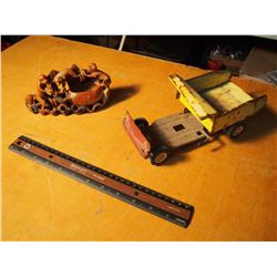 Metal Toy Truck Carcass And Caved Stone Money Mantle-piece