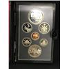 Image 2 : 1981 CANADIAN PROOF SET, ALL COINS PROOF FINISH WITH SILVER TRAIN DOLLAR, .500 SILVER, IN CASE