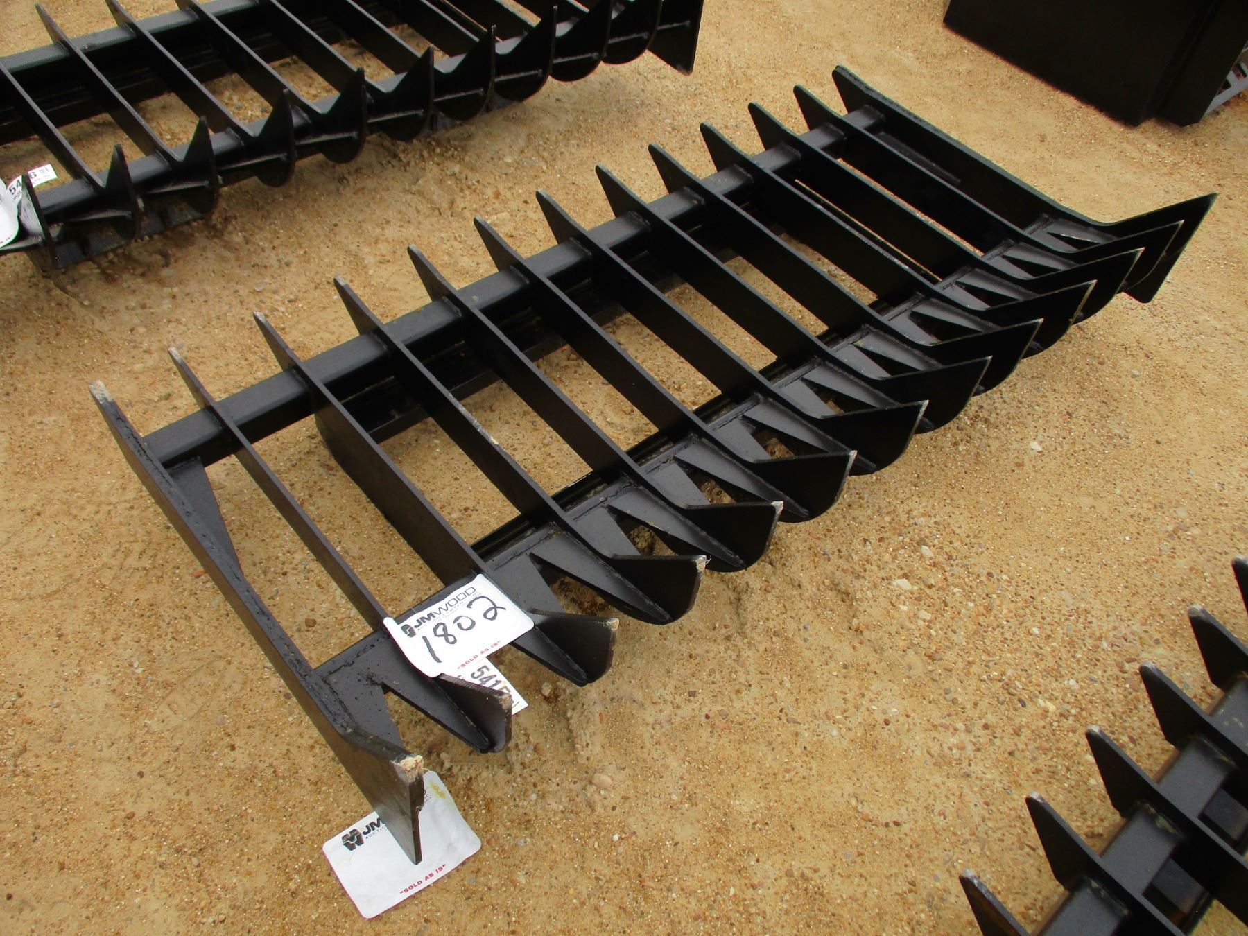 ROOT RAKE FOR SKID LOADER 34.5 X 69.625 J.M. Wood Auction Company, Inc.