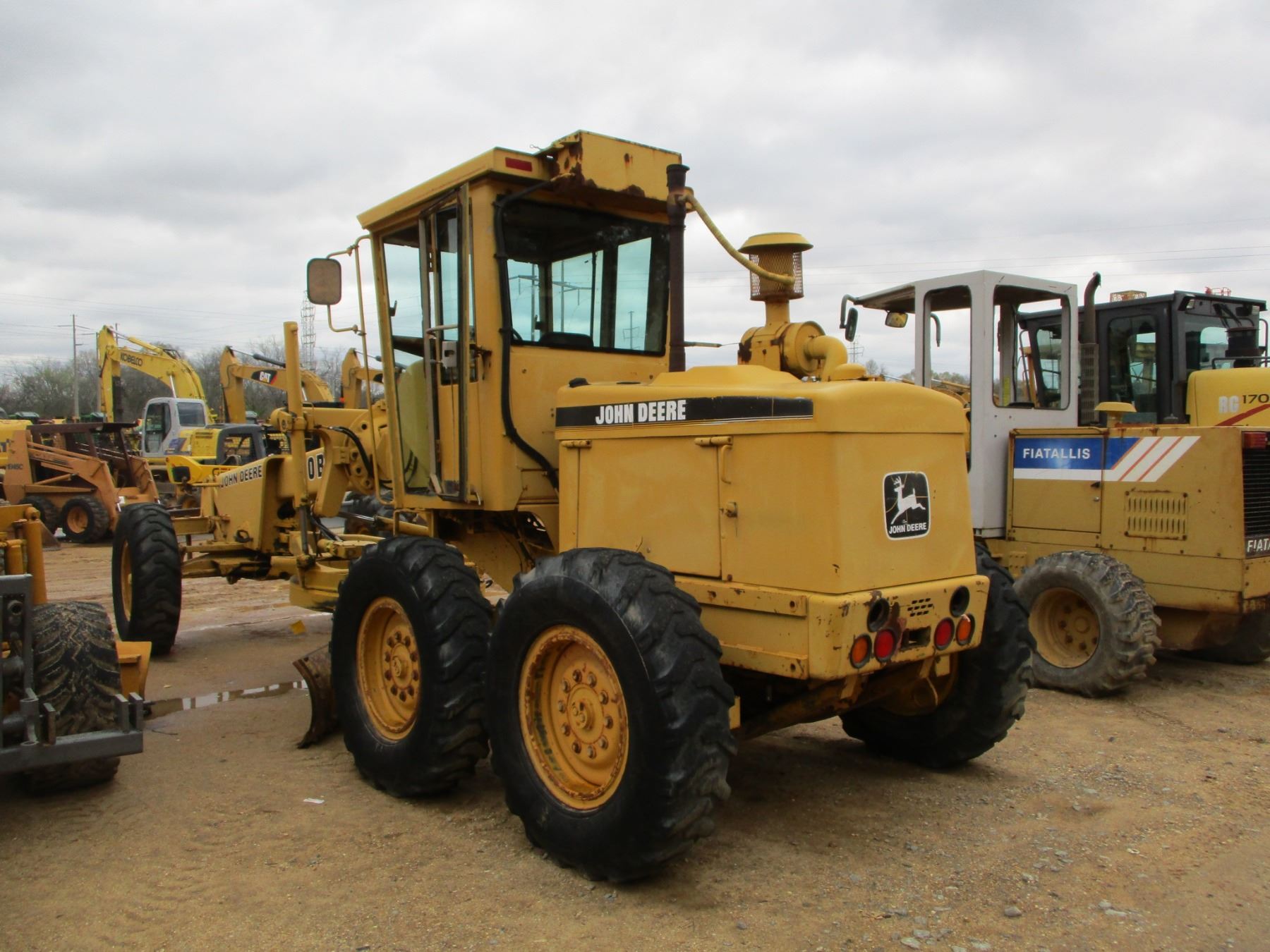 JOHN DEERE 570B MOTOR GRADER, VIN/SN:518496 - 12' MOLDBOARD W/TIP ...