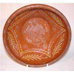 Slip decorated redware bowl