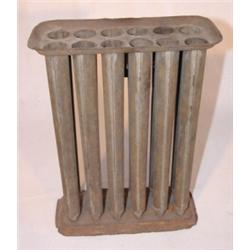 Primitive tin candle mold